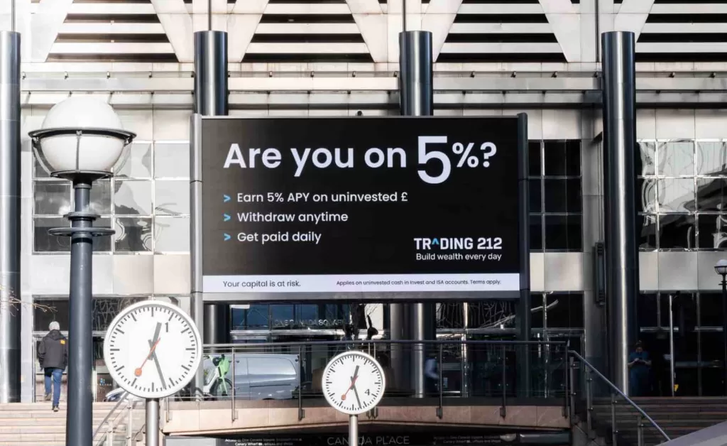 trading 212 advert in train station