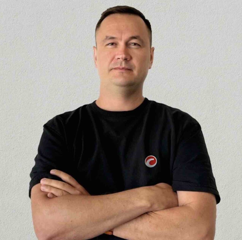 Roman Snegirev in cTrader shirt